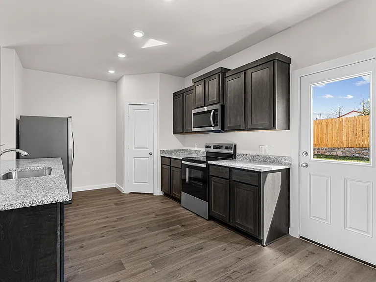 The kitchens have sprawling granite countertops.