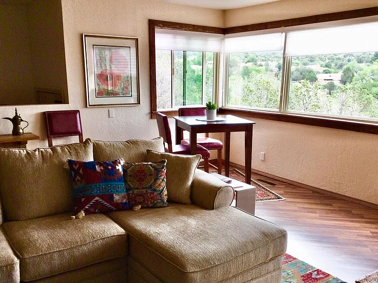 A bistro table was added to the living room: a lovely breakfast spot, or eating while watching the 65" TV!