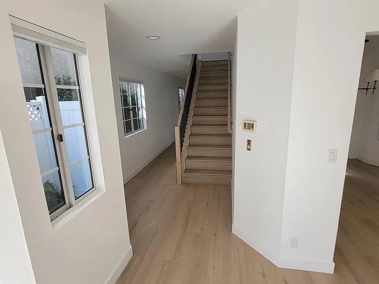First floor view from living room with all new staircase