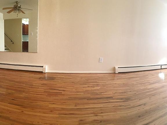 Panorama View of Open Dining Area and Living Area Space