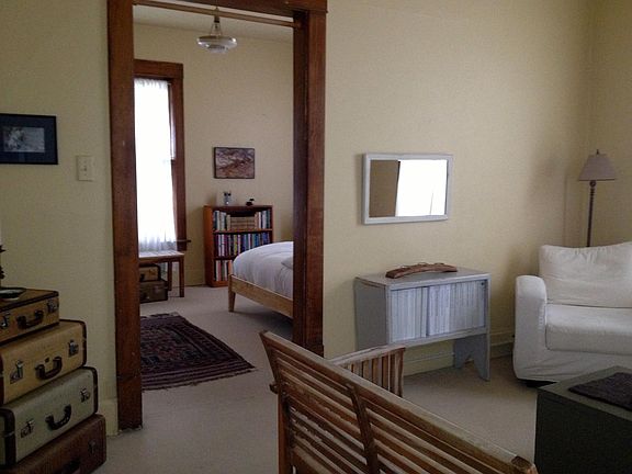 Looking back into southwest room. Either room may be used as bedroom.
