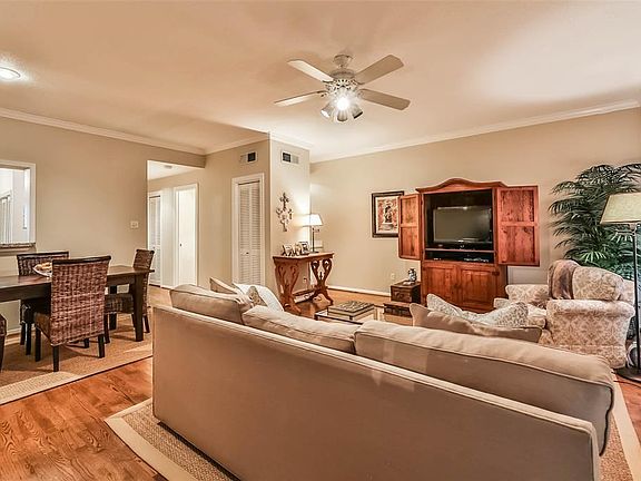 Another view of the living room and how it is open to dining room and kitchen.  Great space for entertaining friends and family.