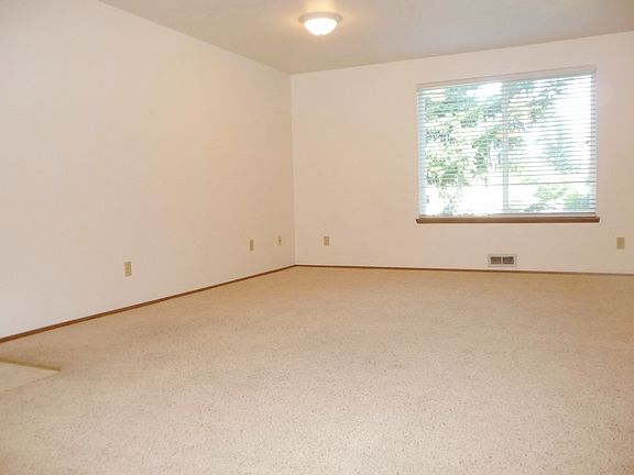 Left side of spacious living room.