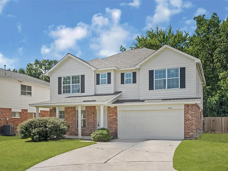 5019 Woodland Meadows Ln — Photo 1