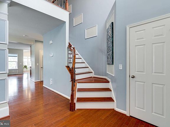 Two Story Hardwood Foyer
