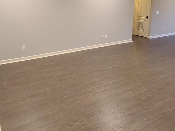 A nearly 400 square foot Living Room accommodates full-sized furniture, guests and family with easy comfort.