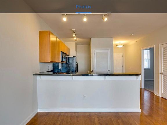 View into the kitchen. Bedroom 1 on right