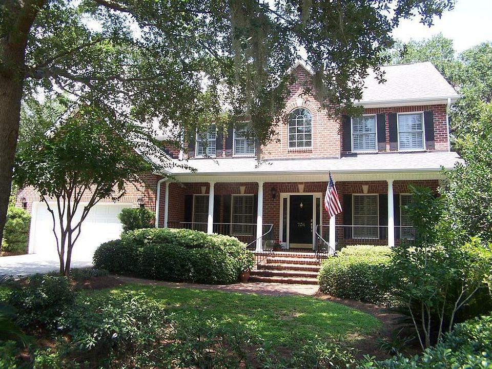 All brick Front with solid brick front porch and Iron Railing