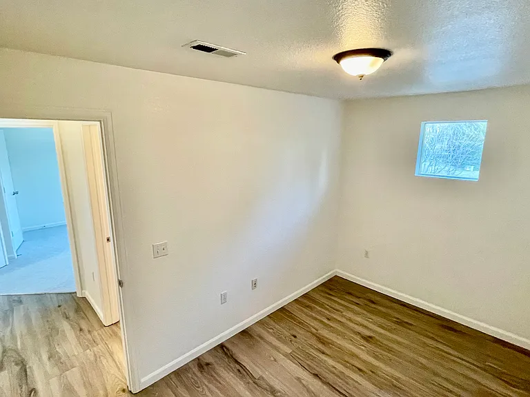 3rd non-conforming bedroom (has window but no closest). Hall closet is large and around t he corner.