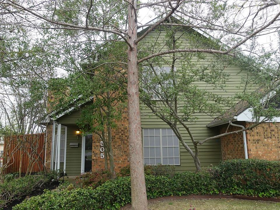 On the corner of Lovers and Fisher. During spring and summer yard is beautiful. Very shady.