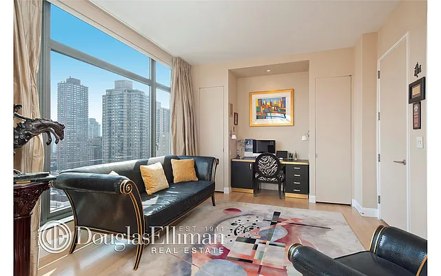 Sold by Douglas Elliman | media 13