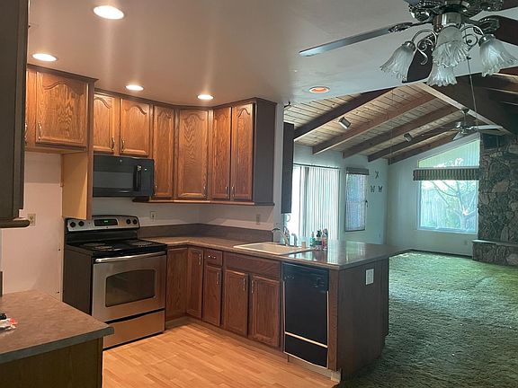 5th image of 8849 Woodman Way