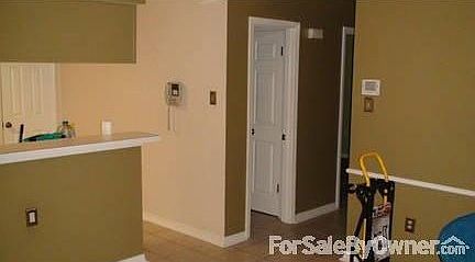 Ceramic Tile and Raised Panel Doors