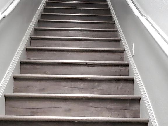 Stairs going to the second floor apartments