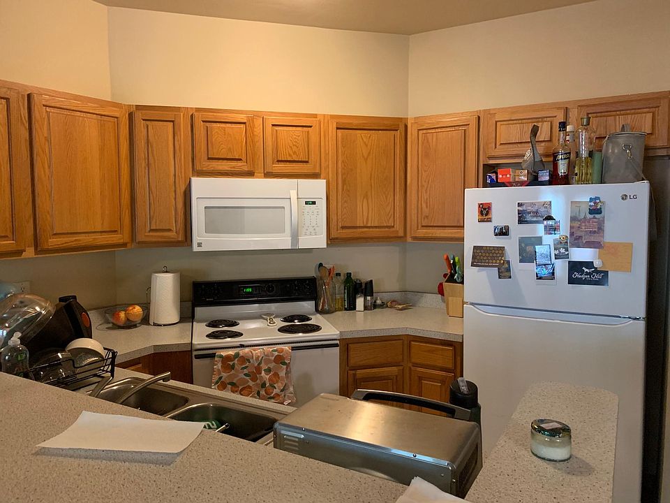 Kitchen with newer fridge, microwave, stove, disposal. dishwasher