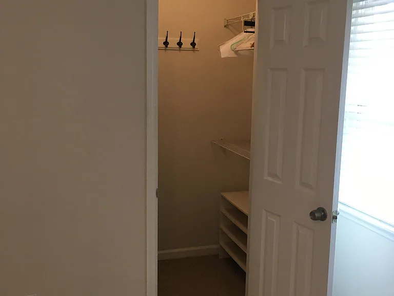 1 of 2 walk in closets in front bedroom