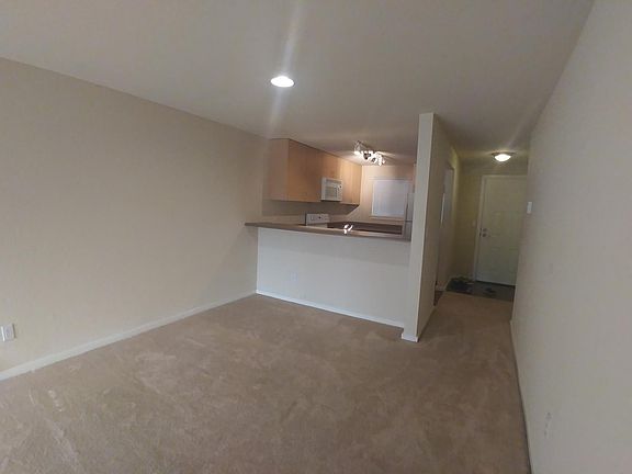 Kitchen and dining area from living room