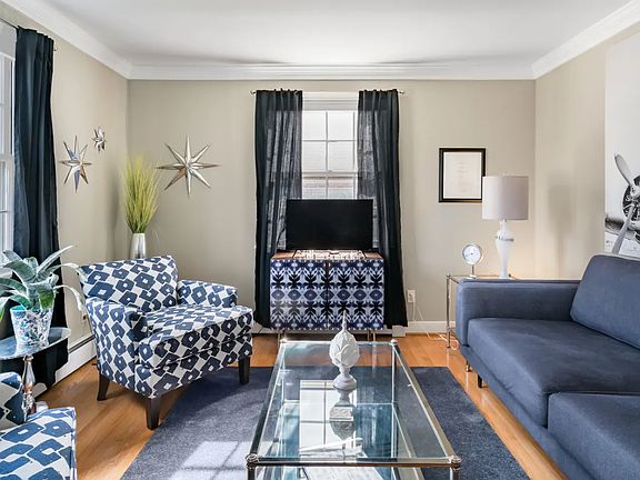 The living room has a flat screen Smart TV with streaming capacities.