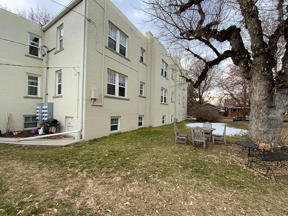 Private side of building with garden and sitting area