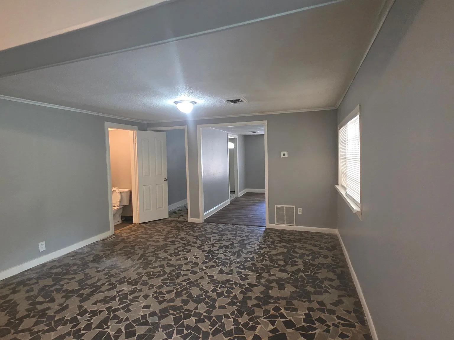 Spacious Split-Level Home with Fireplace, Bonus Room & Outdoor Living — Photo 4