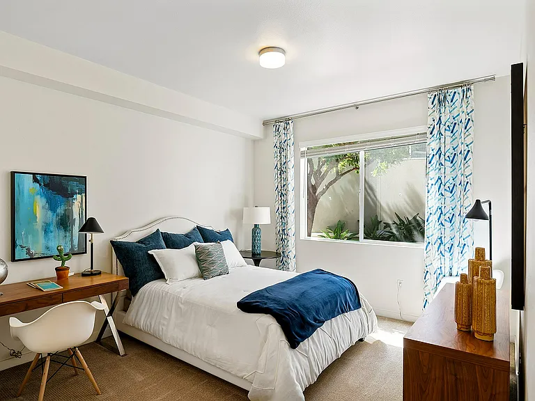 Bright and inviting bedroom in Tempo at Riverpark