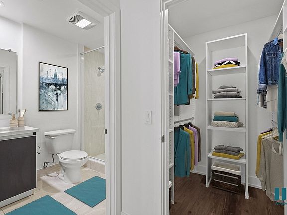 Bathroom and Walk-In Closet with Built-In Shelving