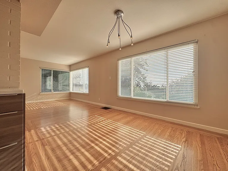 Connected seamlessly to the kitchen, the dining area creates an open and inviting space for intimate dinners or effortless entertaining.