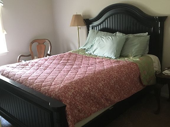 BedrooM with chandelier 