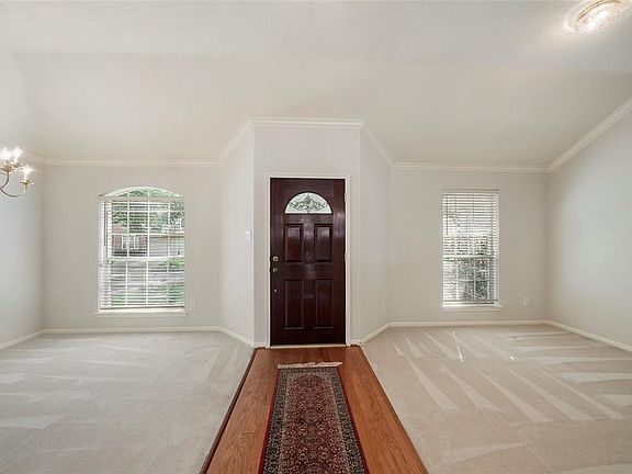 Entry way with view of Dining Room and Study/Library