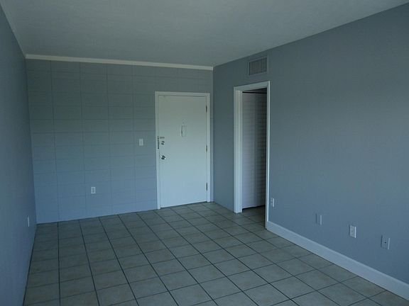 Living room back to the entrance door
