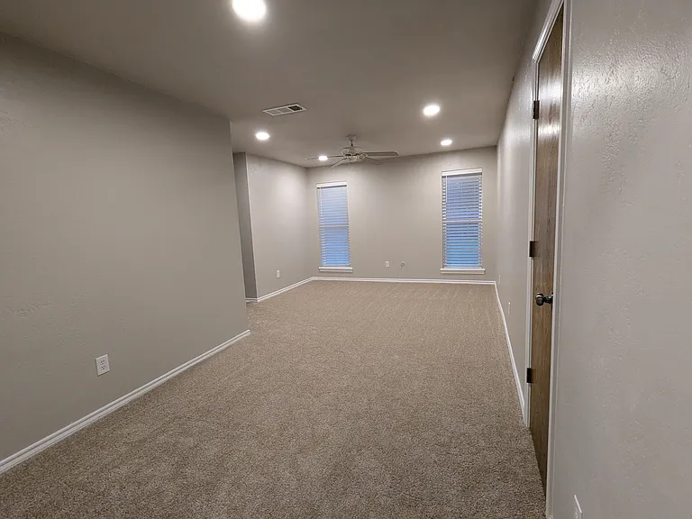 MASTER BEDROOM: Has a small closet to the right and a LARGE WALK-IN Closet off the bathroom, The front part of the bedroom can be used as a sitting area