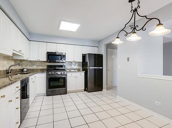 5th image of 7041 W Touhy Ave APT 608