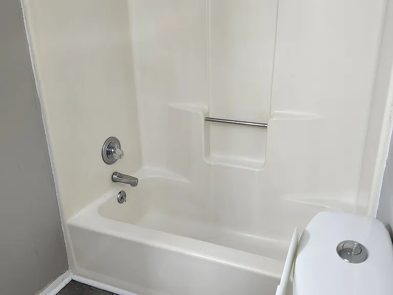 Full tub/shower combination; high seated toilet; newly tiled floors and upgraded bathroom cabinet, sink & faucet combination.