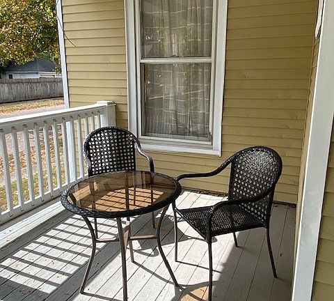 Enjoy neighborhood views from the charming covered front porch