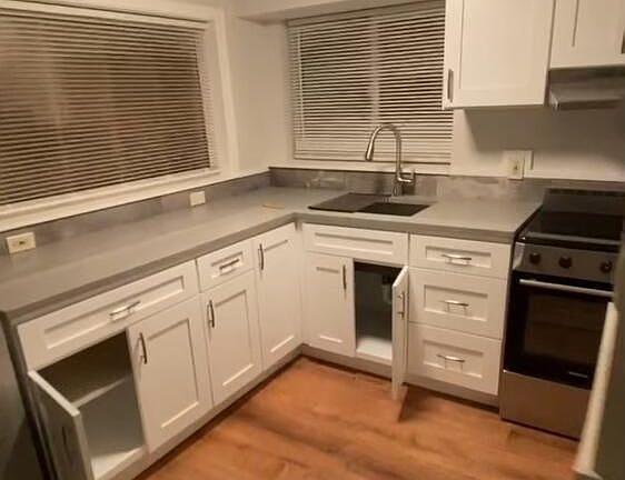 Plenty of cabinet space and updated flooring