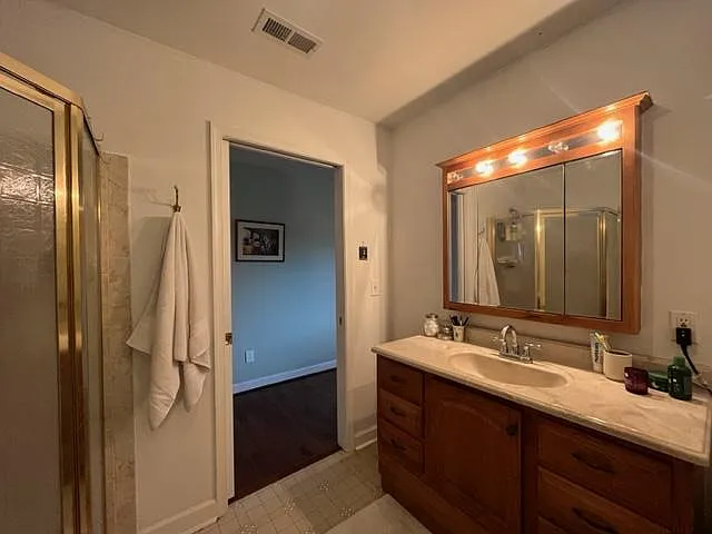 Pocket door leading to second bedroom.