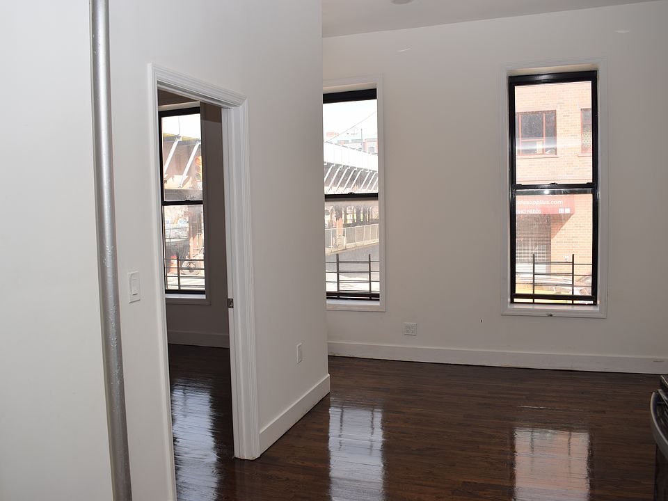 1st image of 100 E 123rd St APT 2F