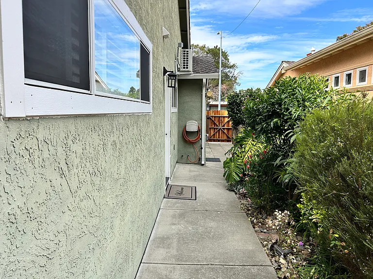 Side Entrance View with Gate towards street