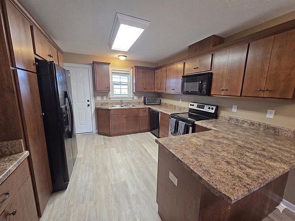 3rd image of 6102 Village West Ln