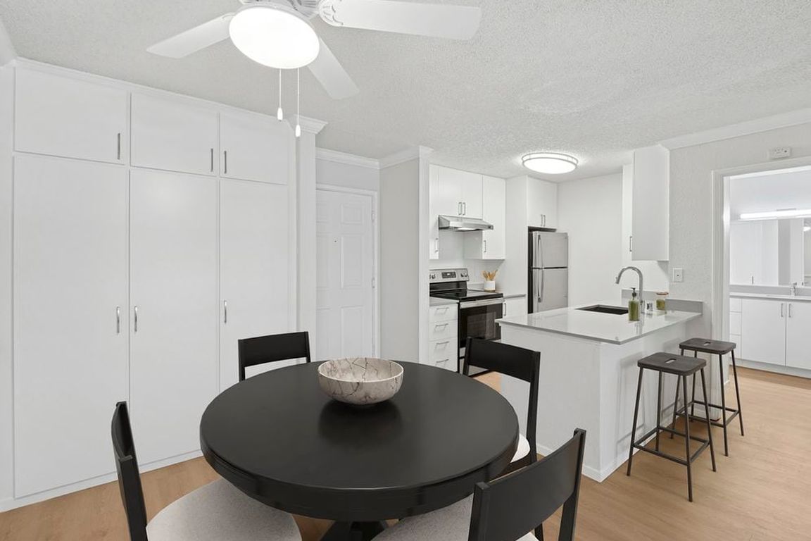 Renovated Package I kitchen and dining area with hard surface flooring