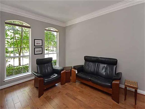 Spacious Formal Living With 9 Foot Ceilings and Gorgeous Crown Molding. Enjoy the View of Your Beaut