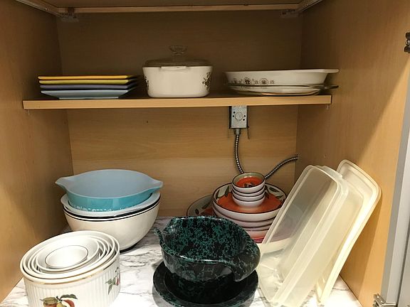 Pots and pans, serving dishes and baking sheets are all provided.