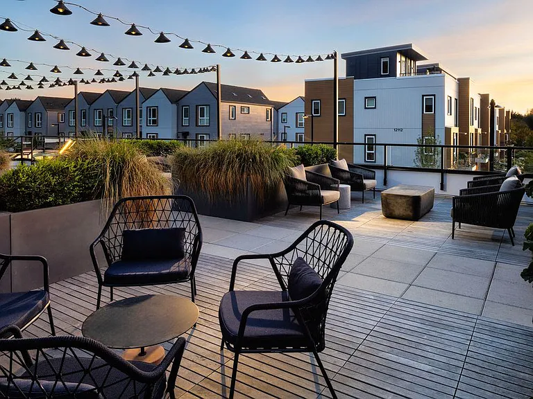Rooftop terrace with multiple seating areas
