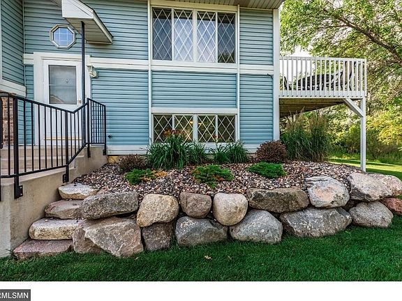 Association wide exterior upgrades include boulder retaining walls, new concrete stair and rails, new driveways w/concrete aprons & irrigation system.