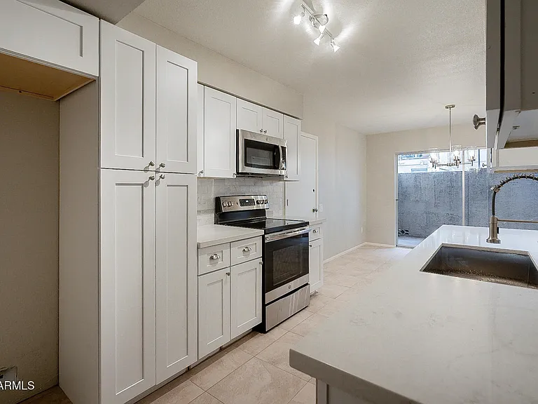 5618 S Captain Kidd Ct #D — Photo 14
