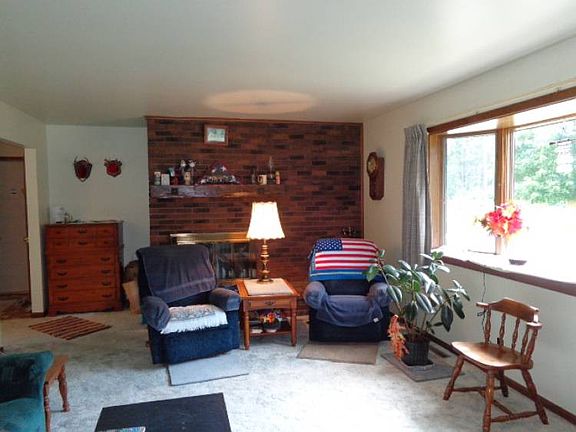 Living room with gas fireplace.