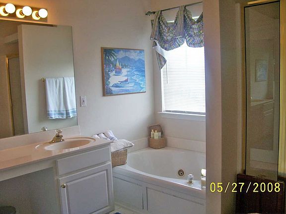 Master Bath with Whirpool Tub, Double Vanites and EXTRA LARGE Walk-in Closet
