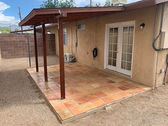 Beautiful covered patio with Saltillo tile. Additional photos to follow.