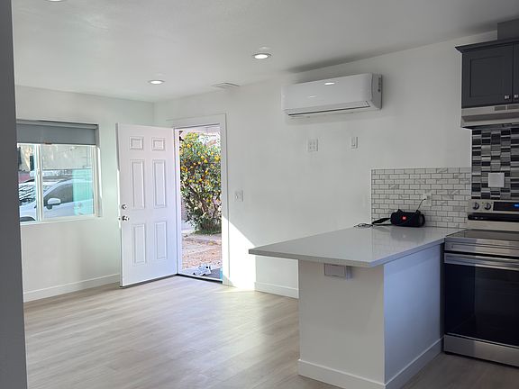 Inside living room and island kitchen