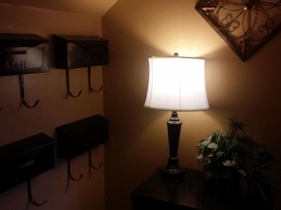 Secure & Brightly Lit Front Hallway is Welcoming For Residen